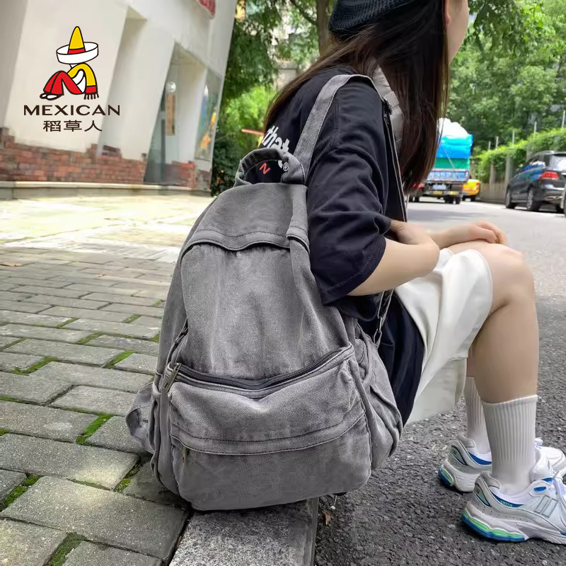 稻草人纯色牛仔布复古双肩包简约女士背包学生户外旅行包学生书包