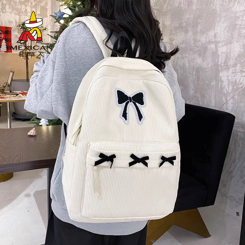 稻草人新款书包初中女生高颜值蝴蝶结双肩包条绒慵懒风大学生背包