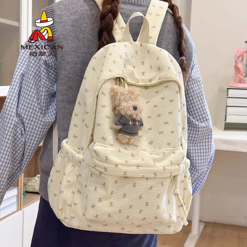 稻草人春季新款韩系甜美风蝴蝶结少女出游背包高颜值中学生双肩包