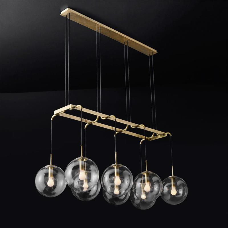 北欧现代简约客厅餐厅吊灯创意魔豆玻璃铜色长形服装店卧室吧台灯