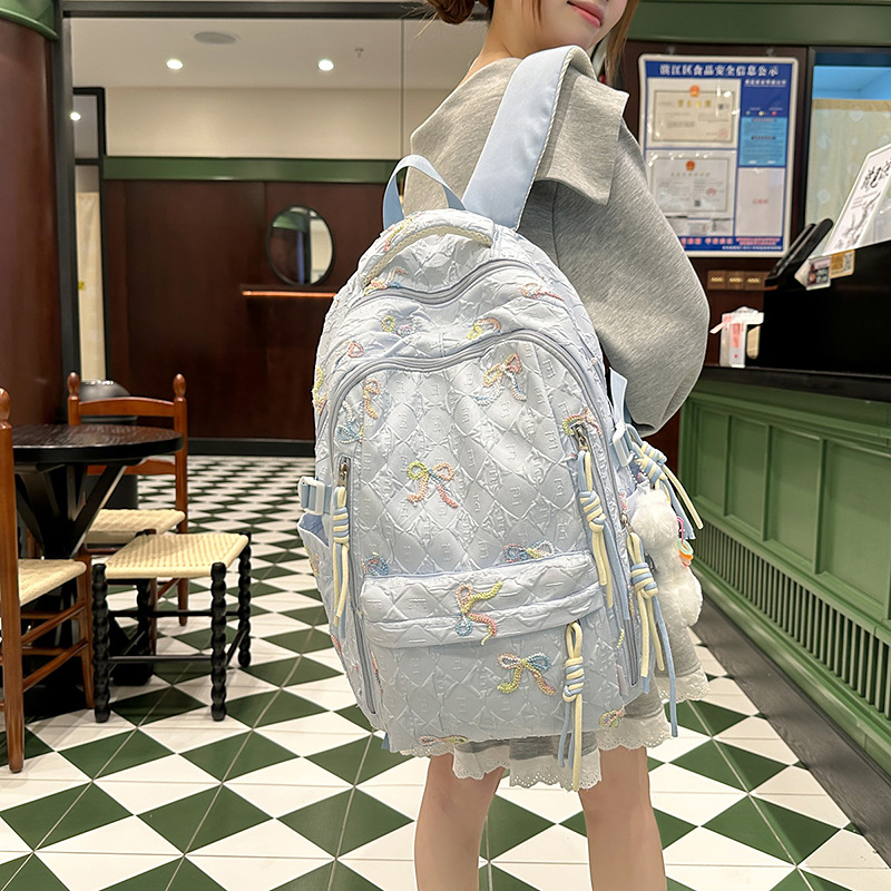 高颜值ins风书包黑色初中女生蝴蝶结双肩包2025新款女小学生背
