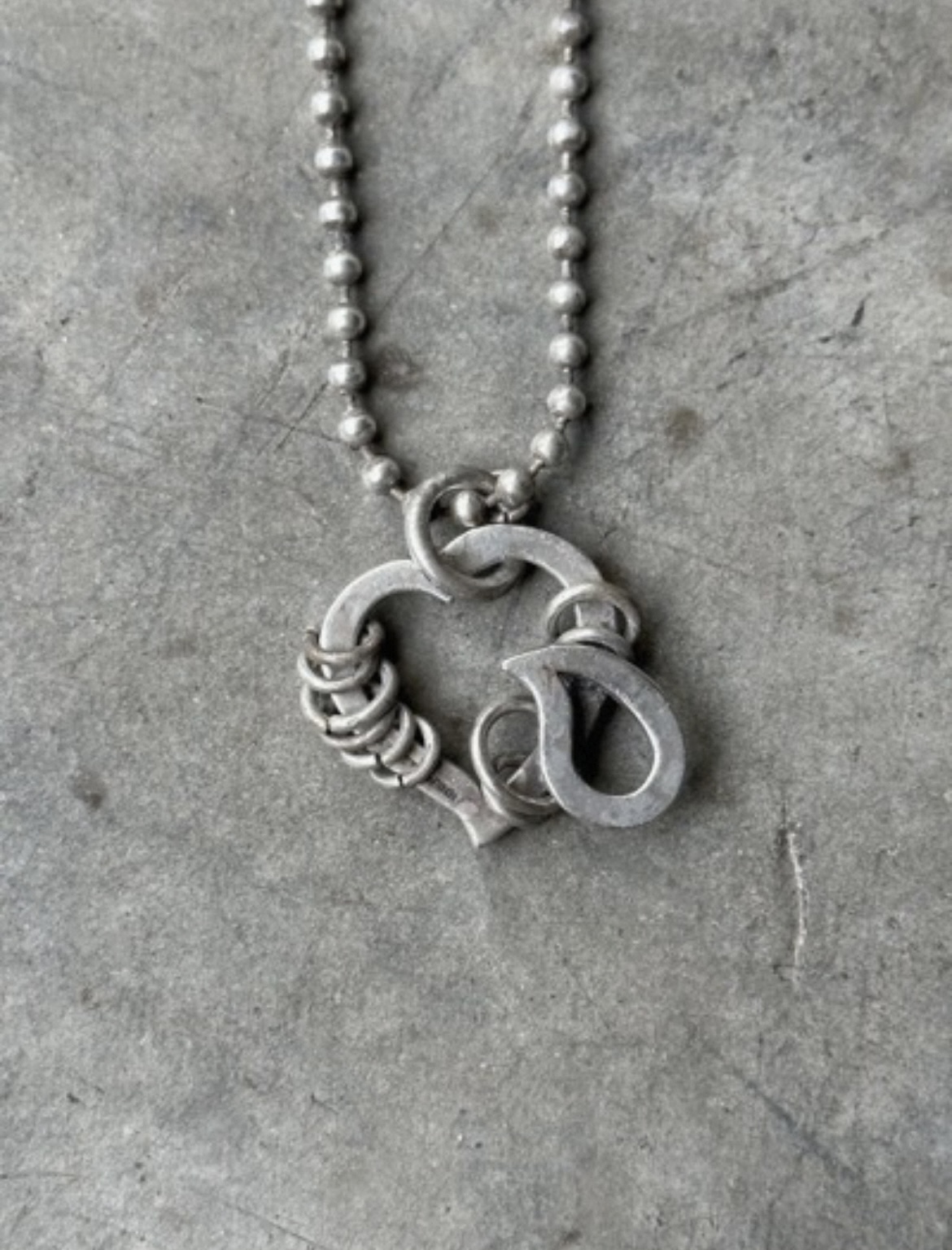 thumbnail for Number (n)ine heart-shaped tear necklace