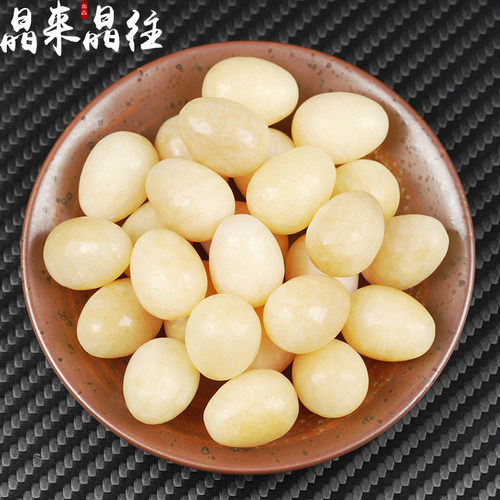 米黄玉鸡蛋形手把件摆件