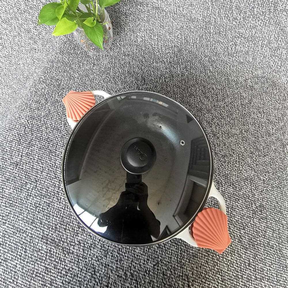 新款直销厨房锅盖耐高温把手套防隔烫硅胶砂锅碗碟贝壳隔热夹防遗