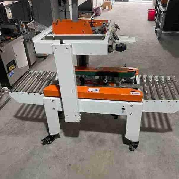 九成新4030封箱打包机 快递箱牛奶箱鞋盒打包 半自动流水线封箱机,办公设备/耗材/相关服务,包装机,淘宝优惠券,粉丝福利购,淘宝优惠卷