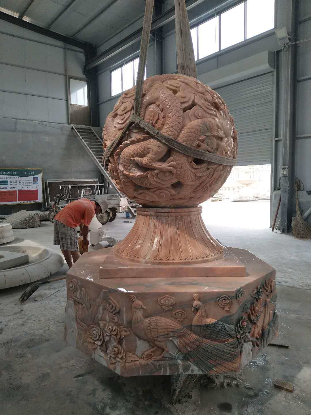 晚霞红石材喷泉水景镂空风水球雕塑 厂家批发石雕风水球喷泉摆件