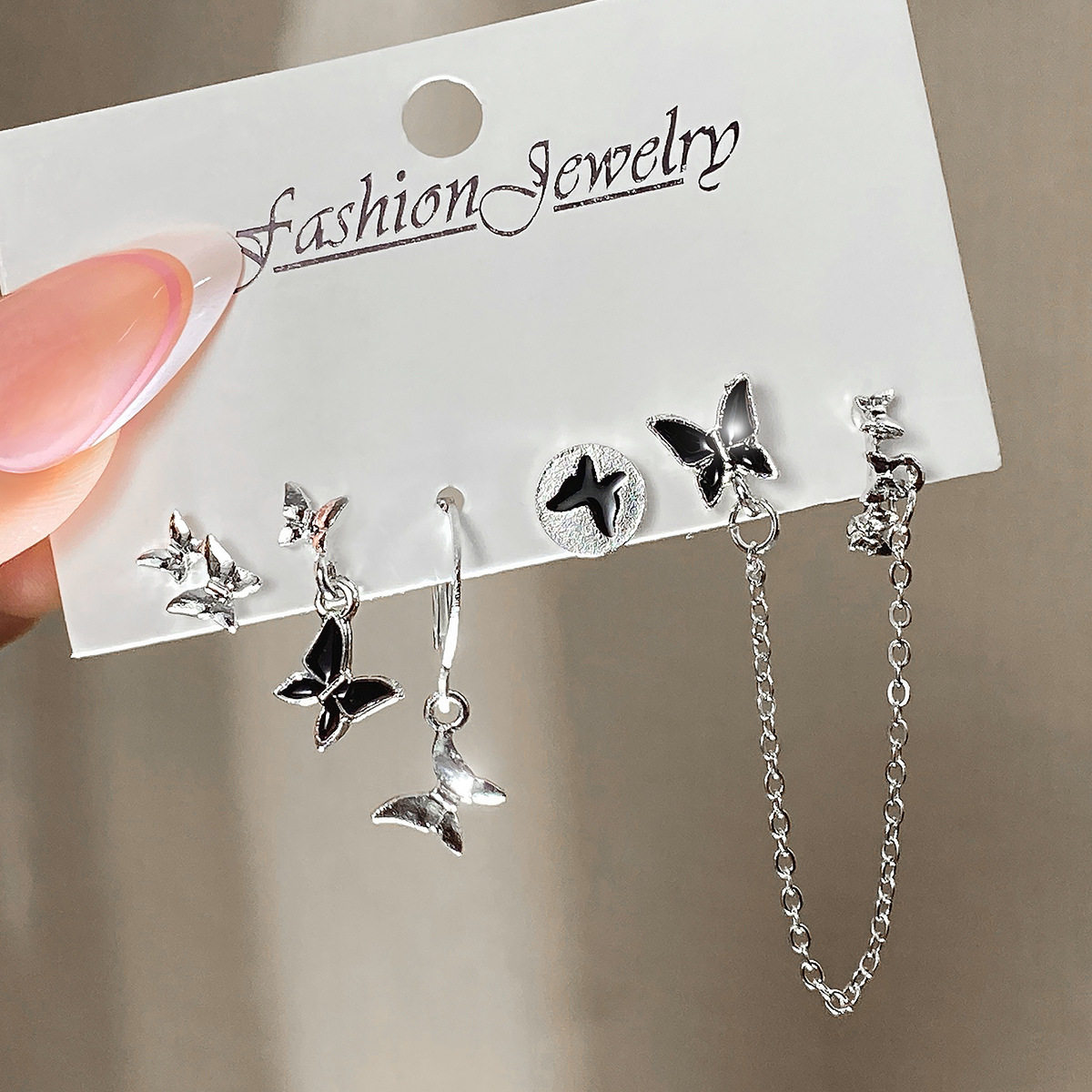 新款热销滴油蝴蝶耳环套装五件套女黑色金属气质耳饰earring - 实物图