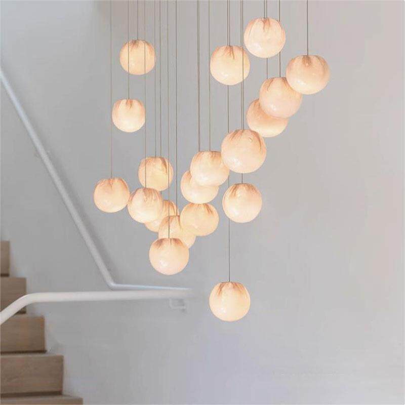 北欧后现代复式楼挑空loft楼梯吊灯别墅客厅餐厅高级感玻璃吊灯