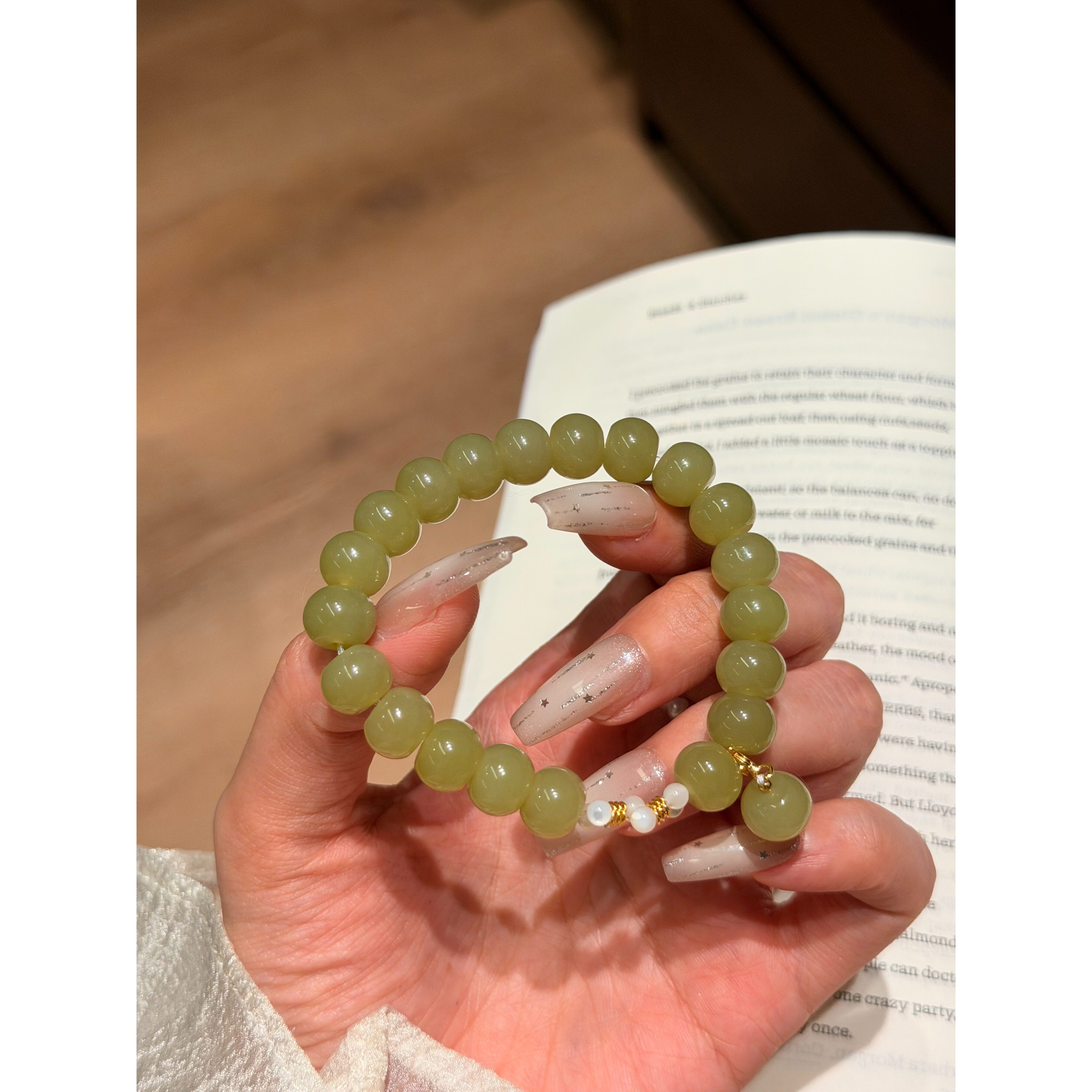白蝶贝和田玉黄口算盘珠手串