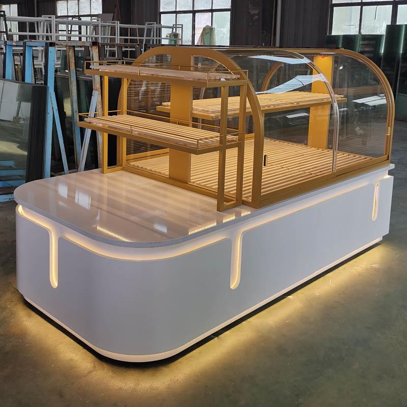 现货新款面包柜圆弧形中岛柜铁艺不锈钢镀钛中岛蛋糕模型玻璃展柜