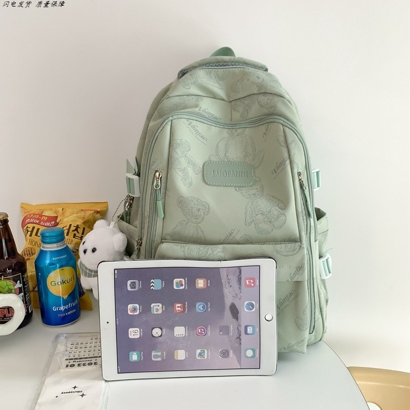 高颜值书包简约大容量大学生女高中电脑背包小众男双肩包登山小包