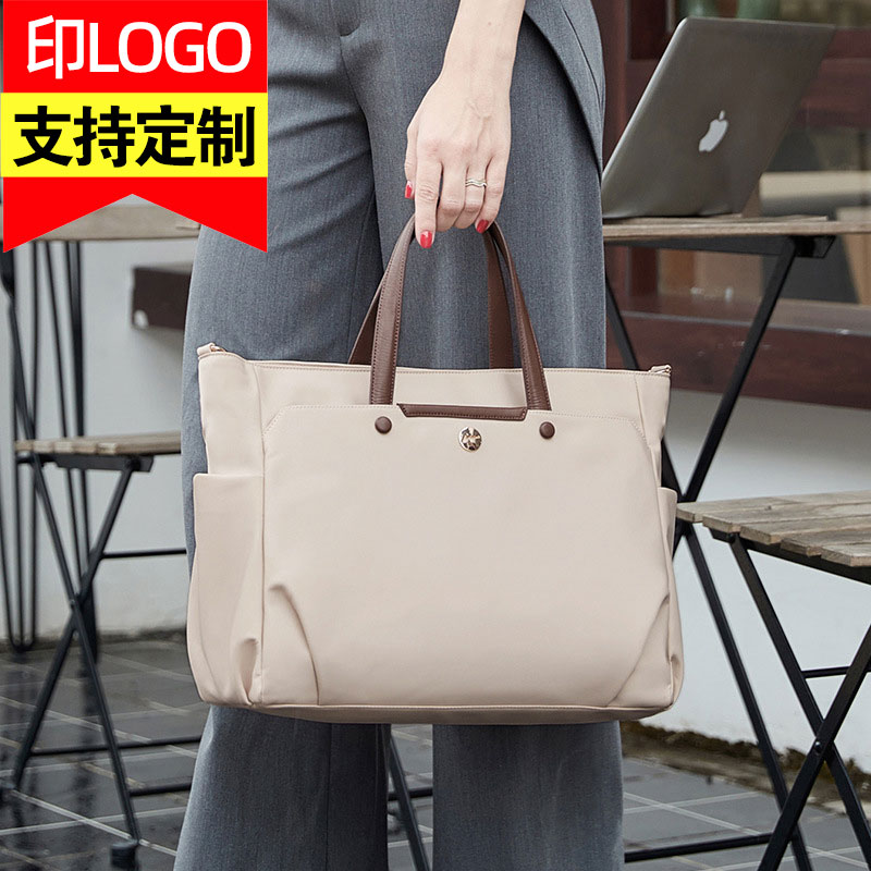 高级感男女士商务手提公文包通勤托特a4笔记本电脑多分隔层大容量