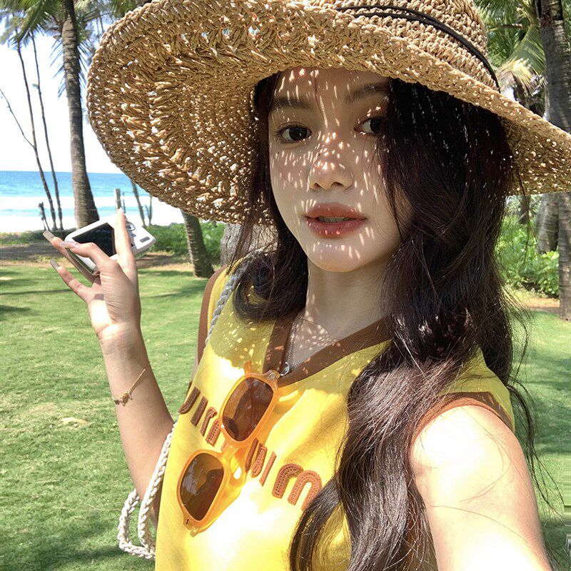 蝴蝶结草帽女2026新款镂空钩花可折叠海边沙滩大帽檐防晒渔夫帽