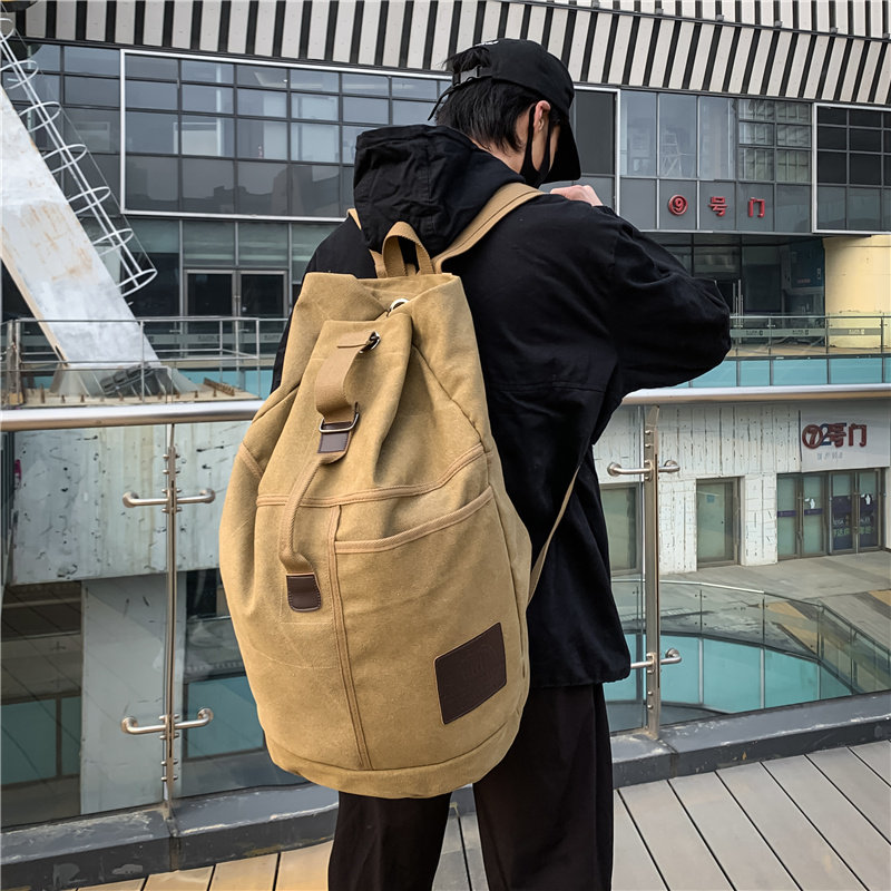 休闲复古男士帆布双肩包户外运动登山短途旅行包男旅游背包水桶包