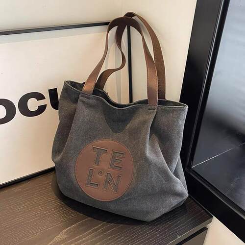 休闲黑色帆布包女单肩手提袋复古托特包大学生质感硬挺帆布袋日常
