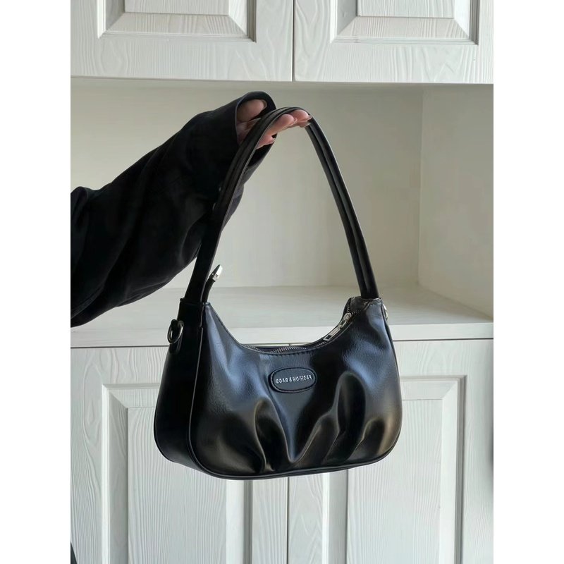 包包女2024新款高级质感百搭褶皱腋下法棍包小众单肩斜挎包新月包