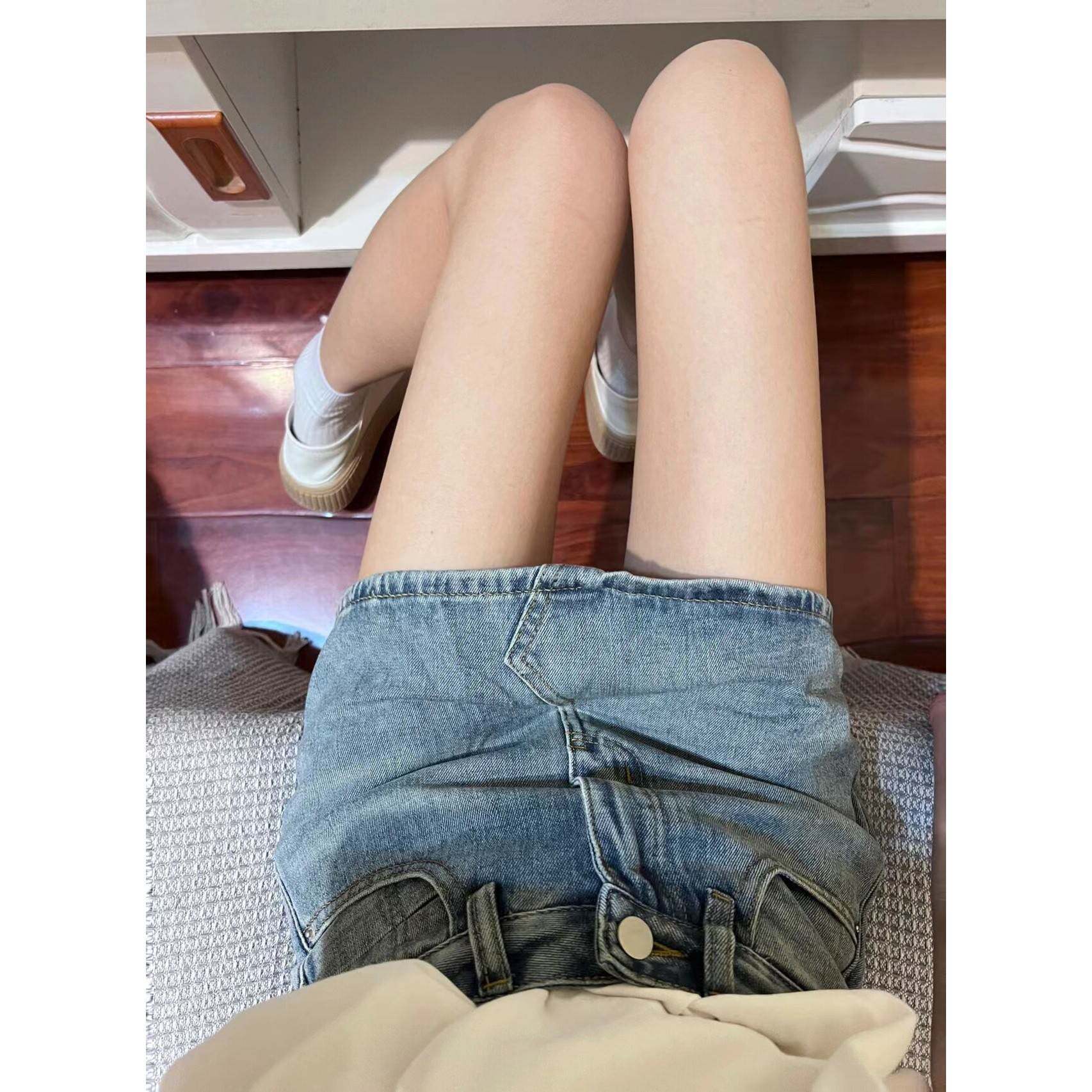 高街时尚甜美热辣高腰牛仔短裙为妇女春夏加码胖毫米瘦身外观设计