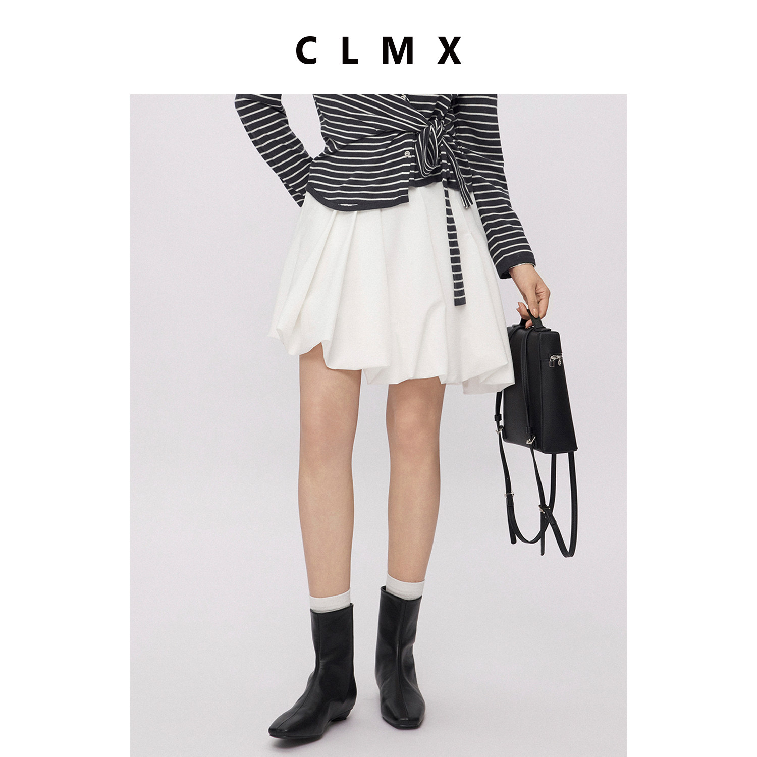 CLMX干爽轻盈四面微弹混纺面料演绎随性浪漫松弛花苞短款半身裙女