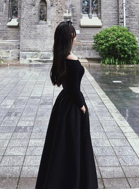 一字肩连衣裙女秋冬气质露肩晚礼服高级感黑色针织长袖长裙子收腰