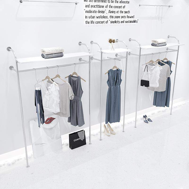 服装店上墙展示架简约轻奢衣服不锈钢拉丝服饰创意女装陈列货架