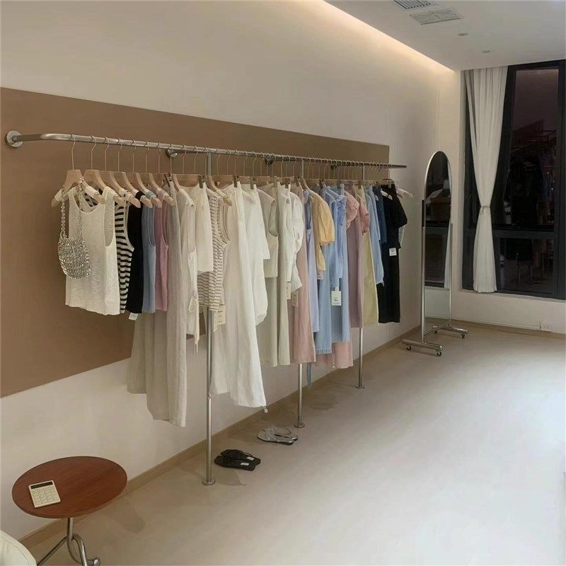 不锈钢服装店上墙展示架简约女装店货架衣服架子壁挂式童装挂衣杆