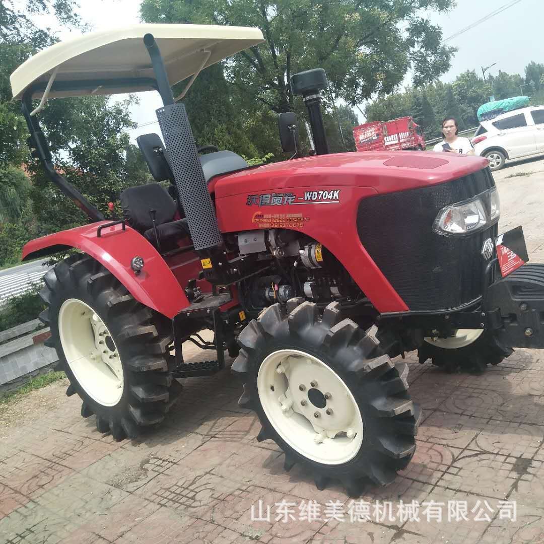 厂家供应704农用四轮拖拉机 水旱两用四驱耕地犁地机 直补价