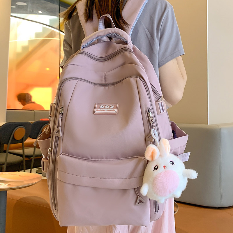 书包女生大学生高中学生初中生小学2023新款後背包大容量背包小众