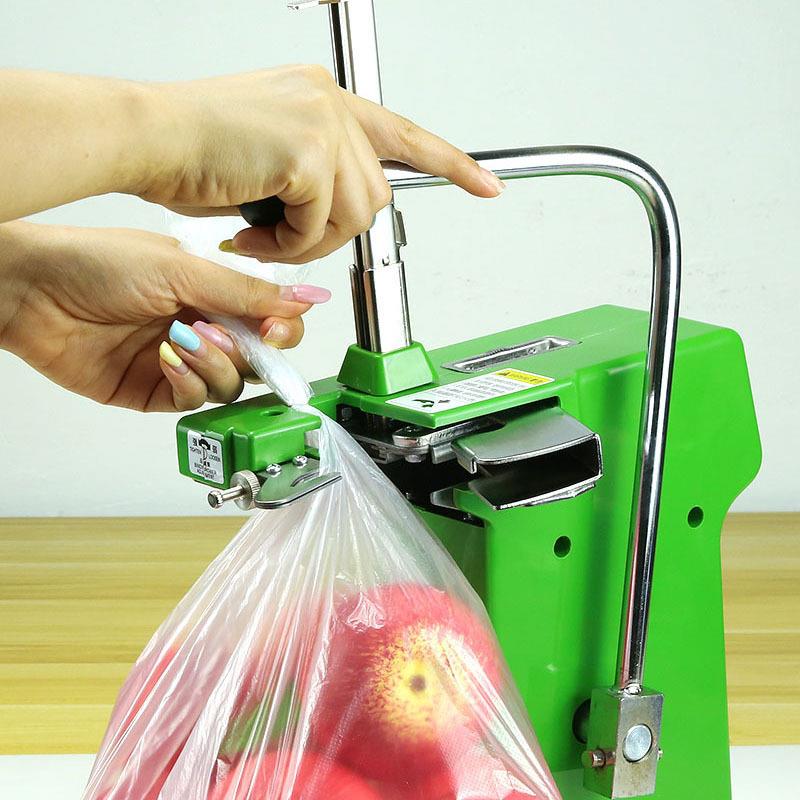 711铝钉机口超市打称区结铝钉机扎束果蔬菜机扎口塑料袋水连卷扎