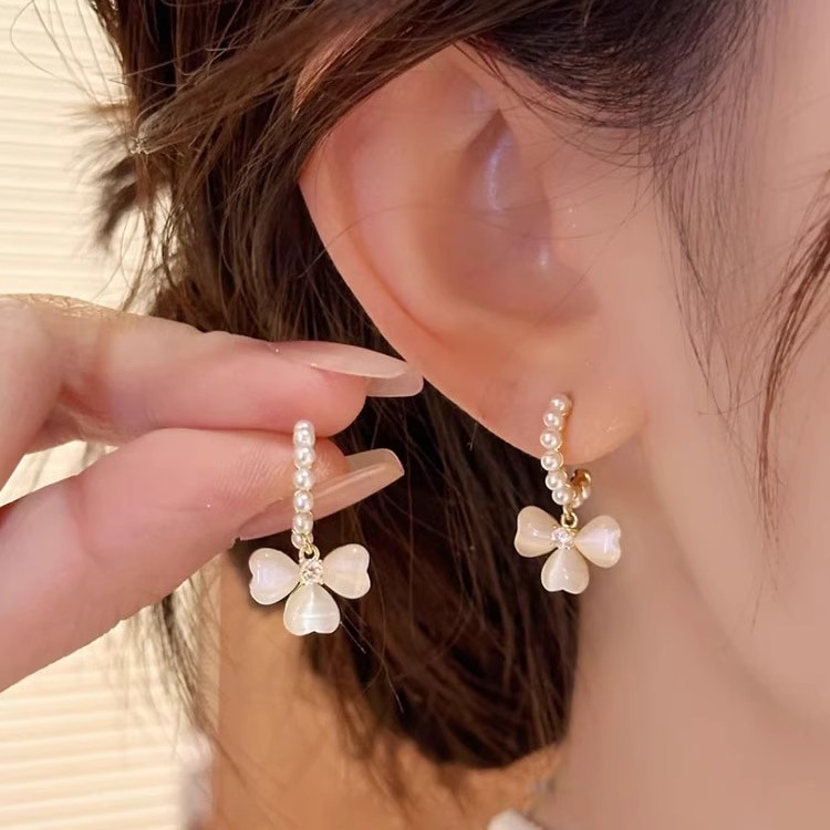 猫眼石蝴蝶结耳环2025新款爆款小众设计感高级珍珠耳扣气质耳饰女