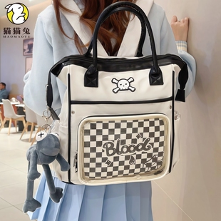 白色痛包日系ins二次元2025新款小型轻便格子初中生带作业书包女