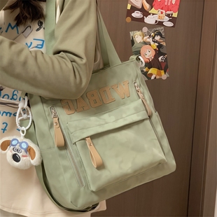 书包单肩包包女学生2025新款大容量斜挎补课包手提袋初中生挎包布