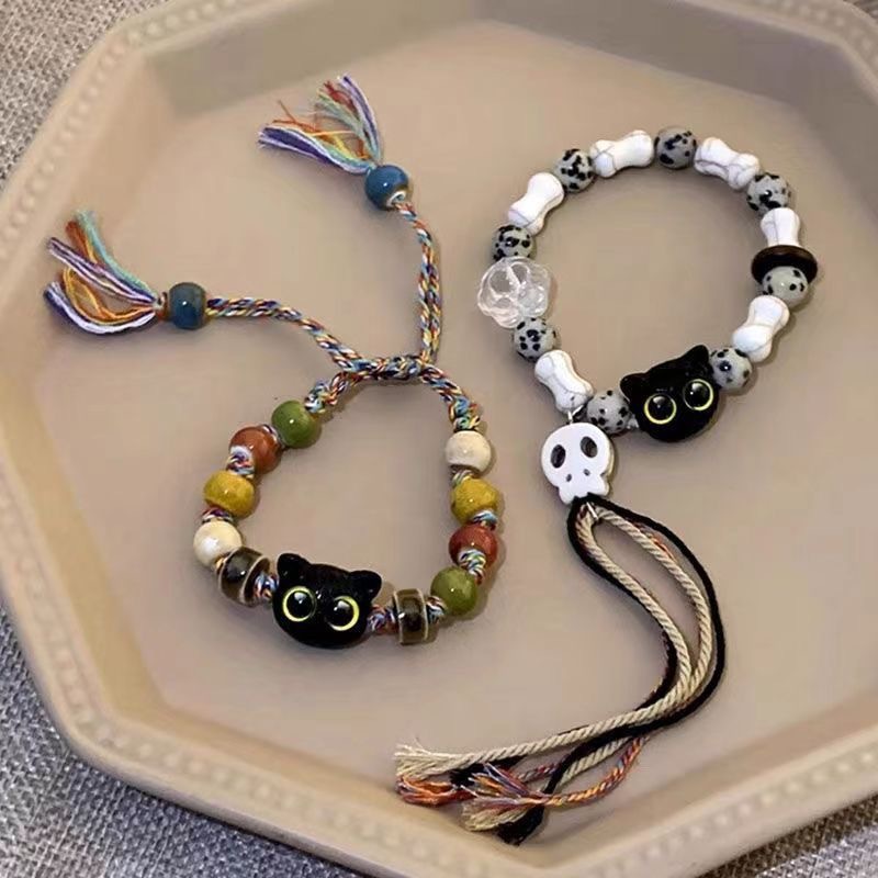 骷髅猫咪编织绳手链男女款小众设计感甜酷中国风流苏彩色手串