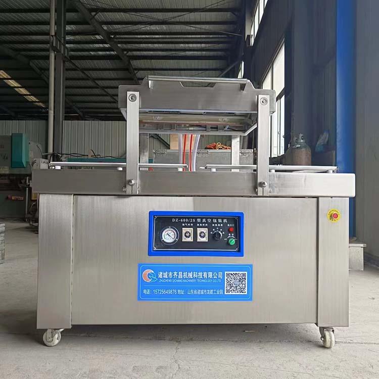 供应江西酱菜竹笋600双室真空包装机豆制品摆盖双腔式真空包装机