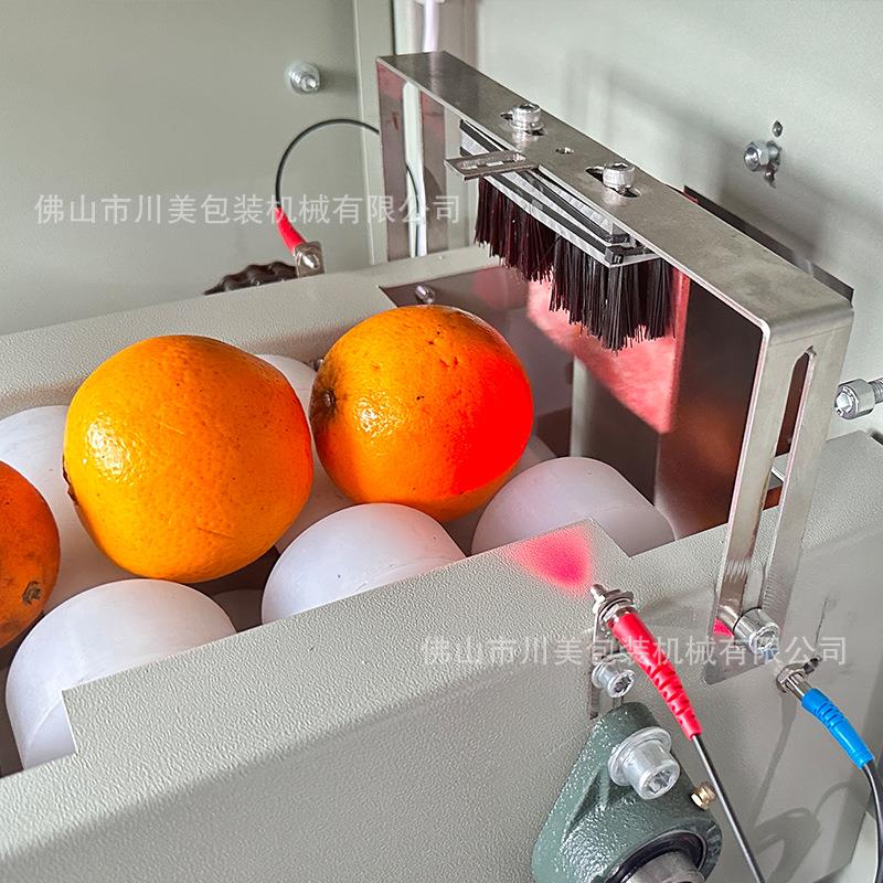 全自动保鲜膜柠檬包装机 单个橙子柑橘套袋包装机 橙子水果包装机