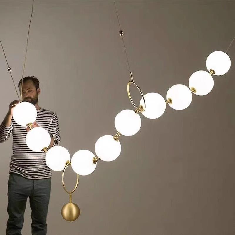 后现代餐厅玻璃圆球吊灯设计师项链造型灯具创意服装店橱窗吊灯