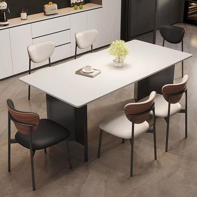 意式岩板餐桌椅2025新款轻奢高级感家用小户型客厅长方形黑色饭桌