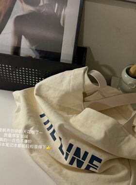 此外 百搭字母白色帆布包女大容量温柔淑女布袋子包包小众搭配款