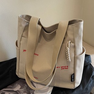 休闲帆布包女单肩包新款布袋子百搭学生上课包大容量上班通勤包女