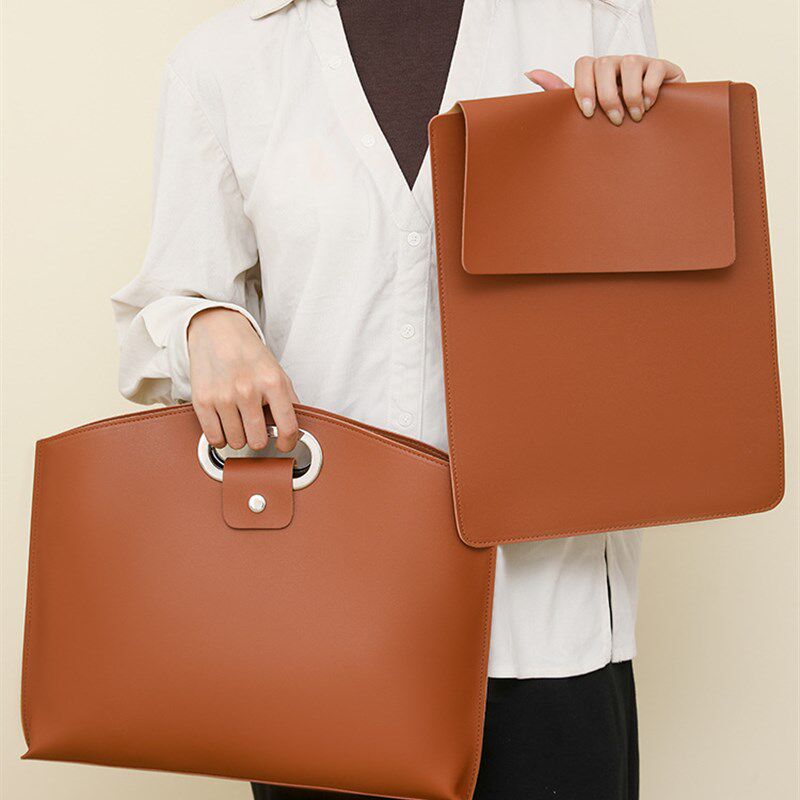 简约高级感包包女2024新款潮时尚大容量手拿包上班U通勤手提公文