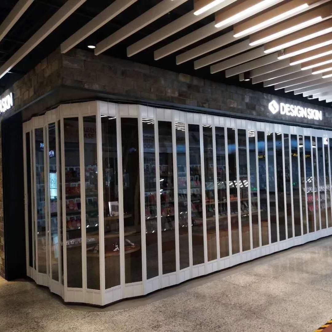 折叠推拉门商场商铺铝合金不锈钢边框弧型横向隔断透明拉闸门电动
