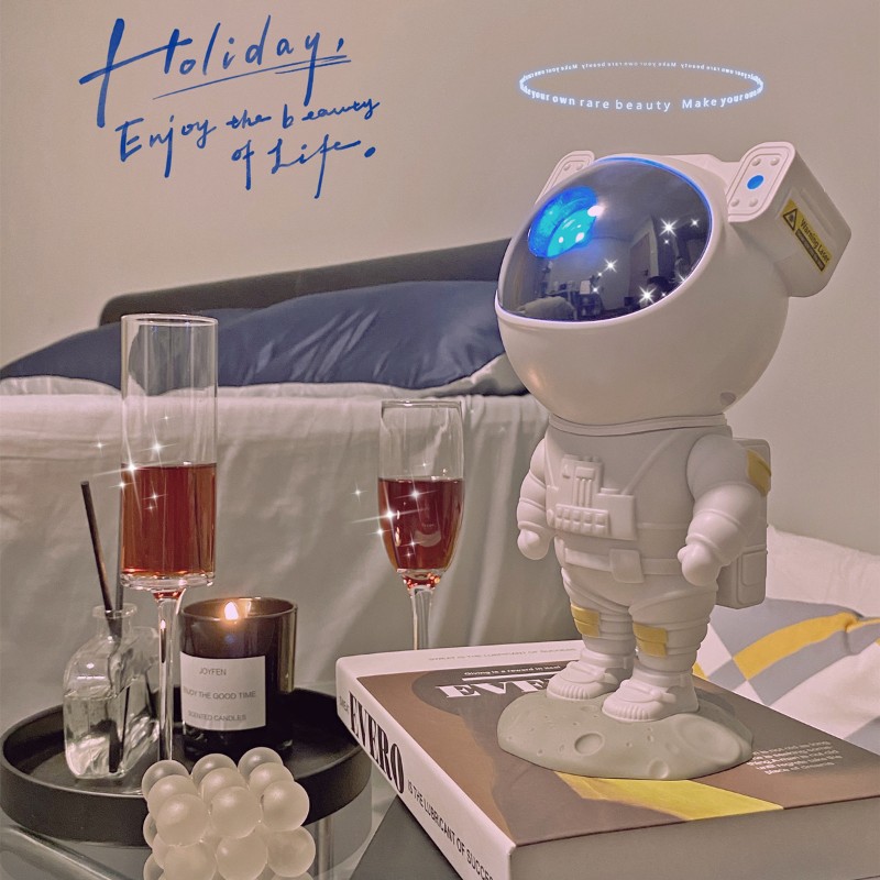 新款圣诞创意儿童礼物太空宇航员摆件星空灯满天星激光投影氛围灯