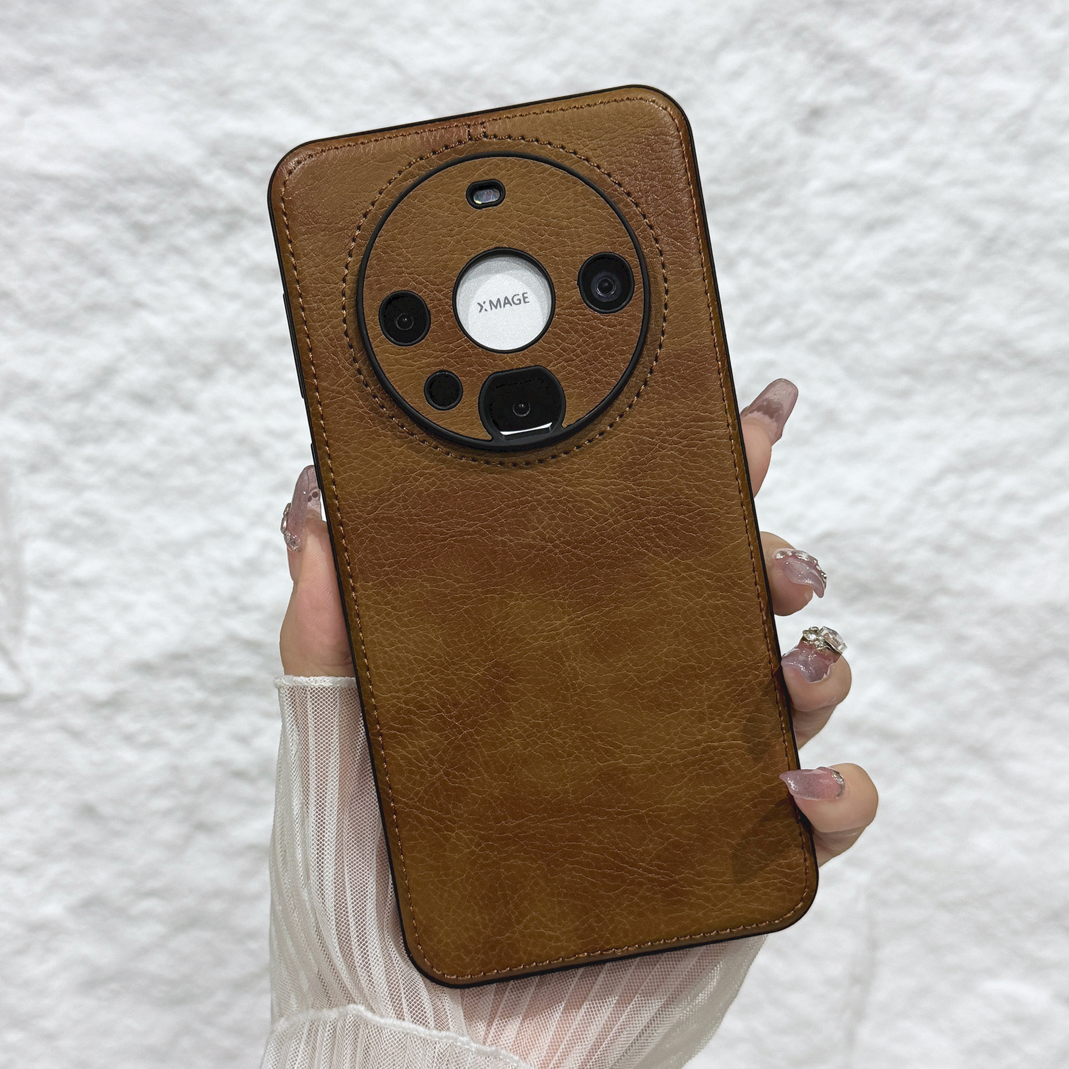 高档皮革 亲肤手感 高出设计 保护镜头