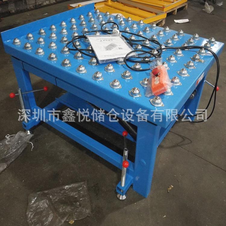 侧翻电动升降平台带滚珠倾斜装卸液压升降台电动翻转升降机