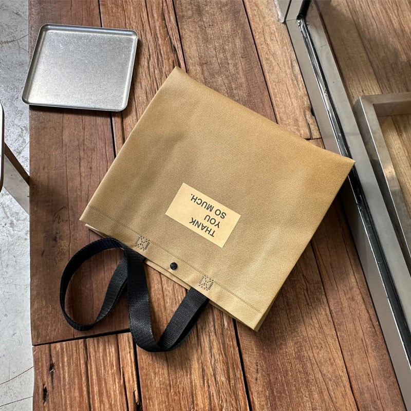 织带手提肩背无纺布手提袋服装店购物袋定K制logo卡其色环保袋
