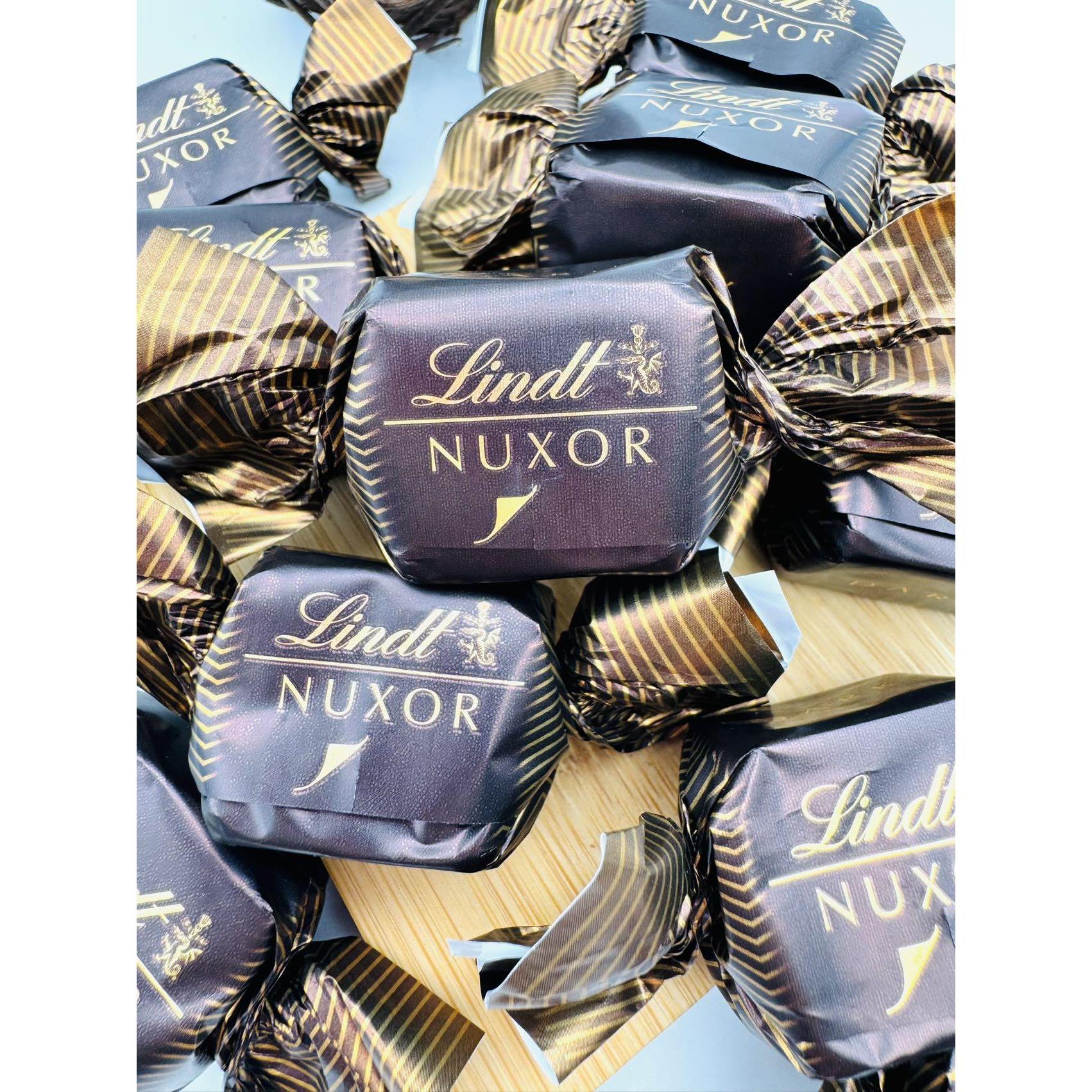 现货 瑞士莲金装新包装密封装榛子榛仁夹心黑巧牛奶巧克力