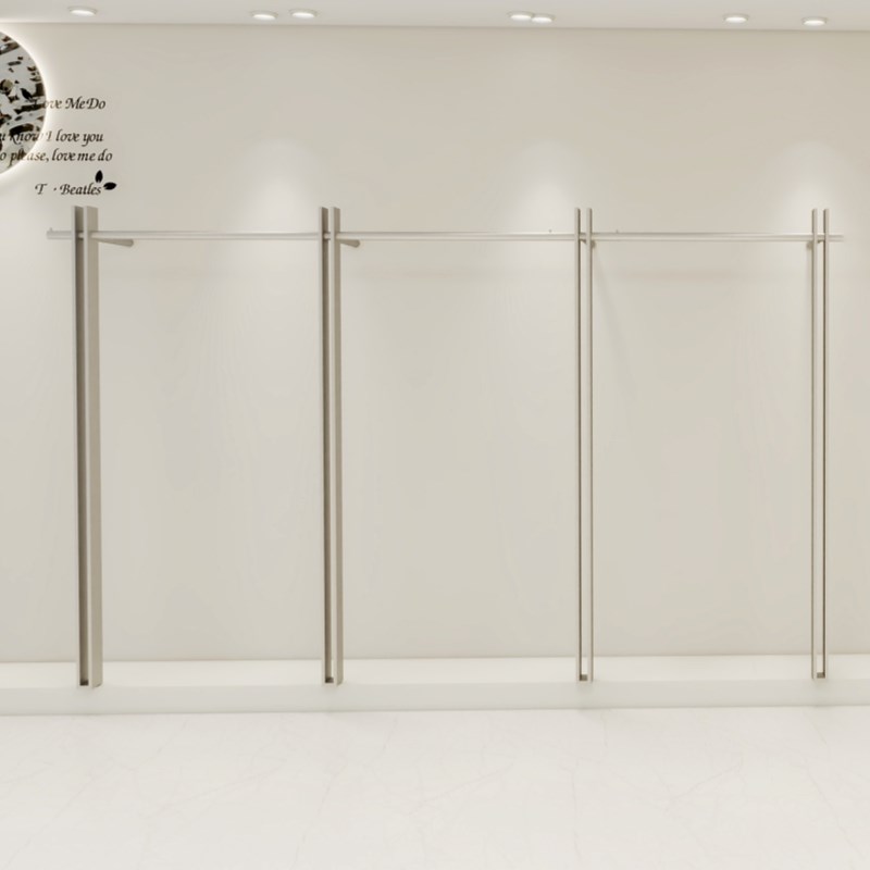 女装店货架上墙不锈钢挂衣架壁挂式陈列架拉丝银服W装店展示架定