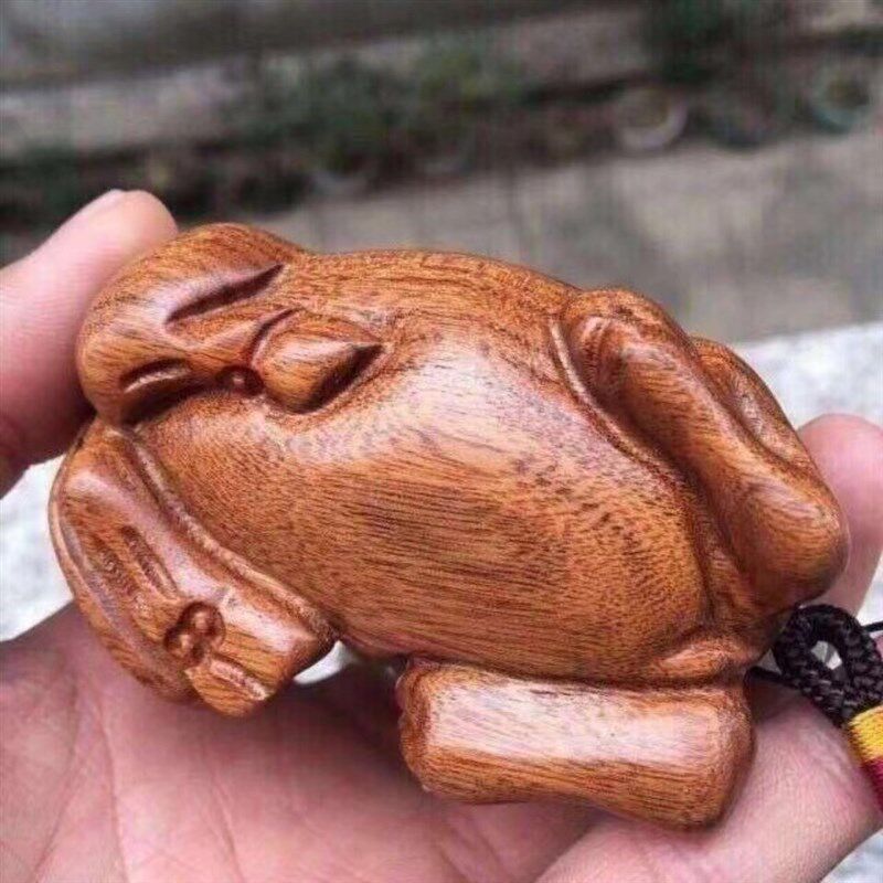 越南黄花梨木雕手把件牛年牛运手工实木雕刻可把玩可Y摆件的工艺