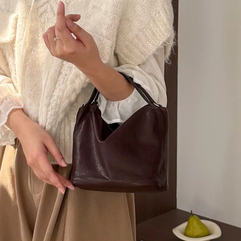 洢昕尚品复古植鞣皮水桶包