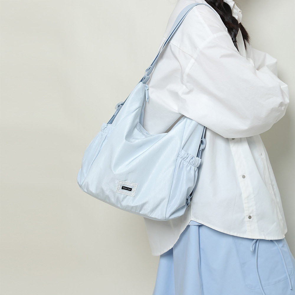 小众设计轻尼龙双肩包小背包女2025春季新款通勤托特包学生