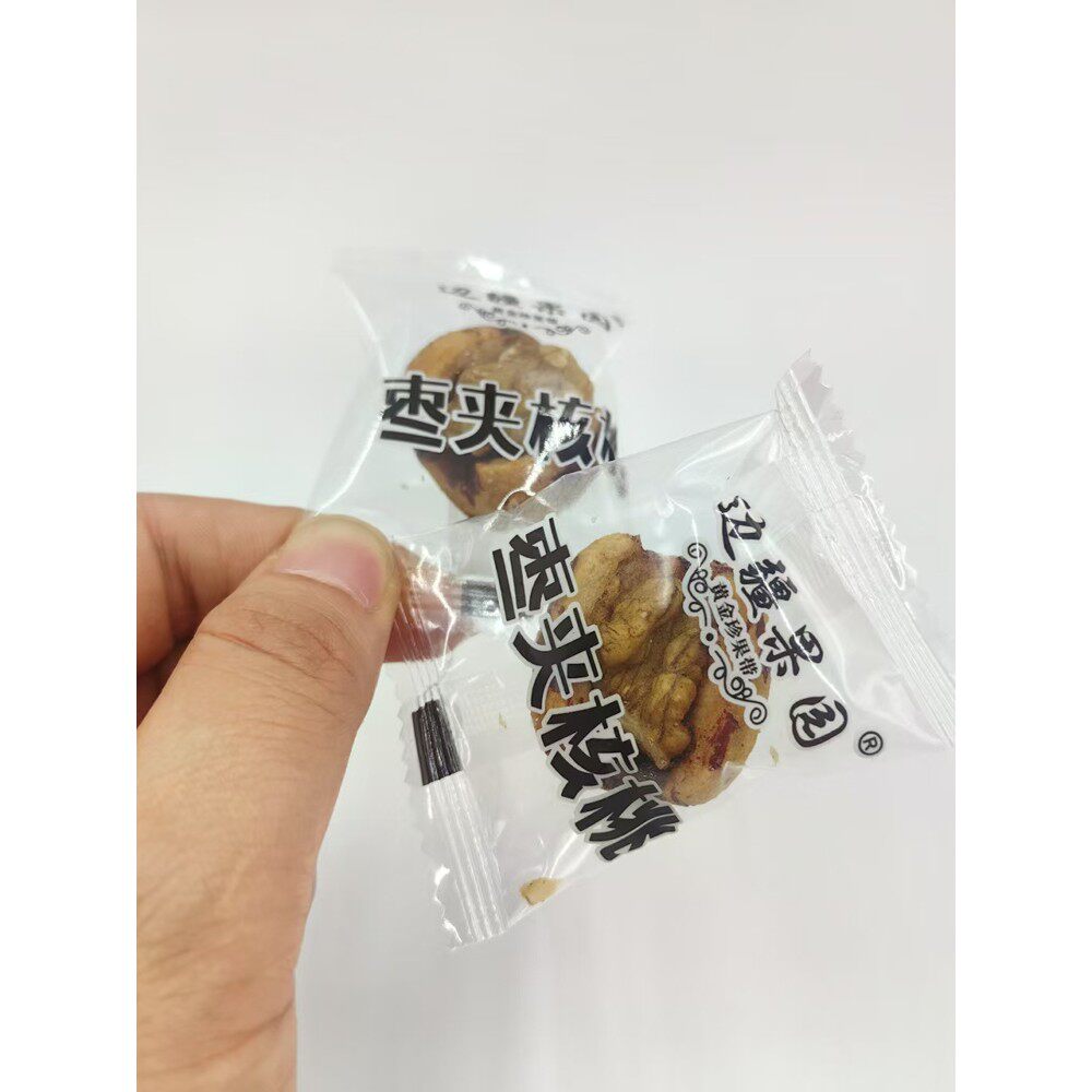 新疆特产新款虎皮灰枣夹核桃仁无核红枣即食干果休闲零食